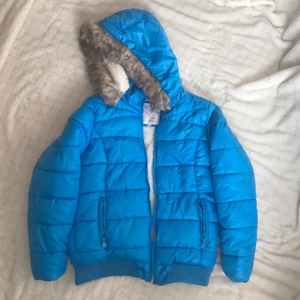 Blue Puffer coat aligned with fur